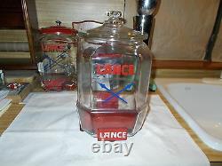 1930's Vintage 12 Lance Jar With Red Metal Stand And Over The Lip Glass LID