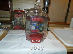 1930's Vintage 12 Lance Jar With Red Metal Stand And Over The Lip Glass LID