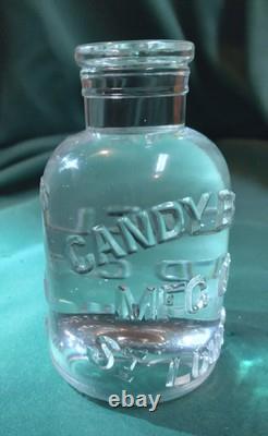 Antique Candy Bros. Mfg. Co. Advertising Paperweight Solid Glass Embossed