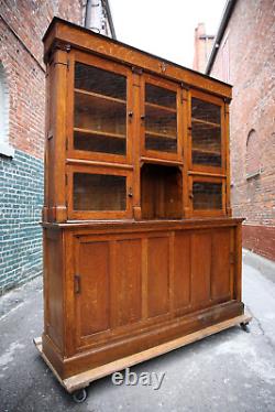 Antique Cigar Store Display Cabinet Apothecary Oak Wood and Glass Doors Brass