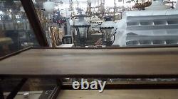 Antique Slanted Glass General Store Display Cabinet with Adjustable Shelf Brackets