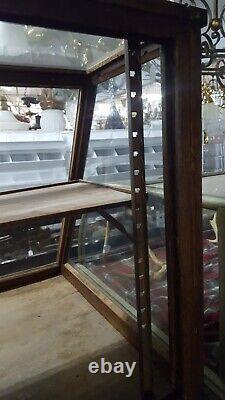 Antique Slanted Glass General Store Display Cabinet with Adjustable Shelf Brackets