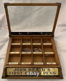 Antique drugstore counter display of John Heath's First Class Pen Nibs