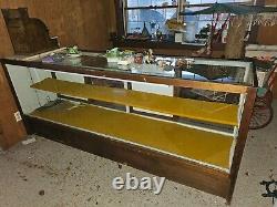 Antique oak and glass sales counter display case