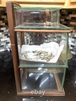 Dr West's Glass display cabinet