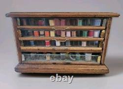 Early A. H. Rice & Co spool cabinet 4 drawer Wood Oak & Glass 19'W x 12H x 18D