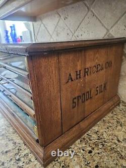 Early A. H. Rice & Co spool cabinet 4 drawer Wood Oak & Glass 19'W x 12H x 18D