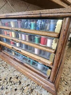 Early A. H. Rice & Co spool cabinet 4 drawer Wood Oak & Glass 19'W x 12H x 18D