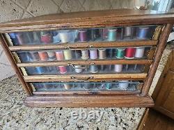 Early A. H. Rice & Co spool cabinet 4 drawer Wood Oak & Glass 19'W x 12H x 18D