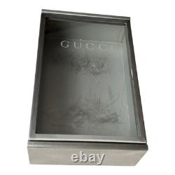 Gucci Made in Italy glass and stainless steel retail store counter display case