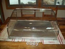 Stainless Steel Store Display Case Has Curved Front Glass