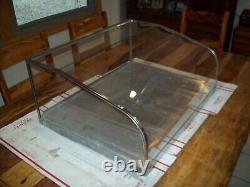 Stainless Steel Store Display Case Has Curved Front Glass