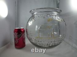 The Nut House Antique Store Glass Display Jar with nut scoop or creamer