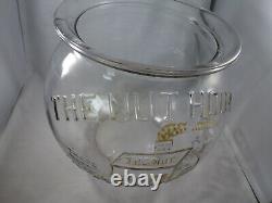 The Nut House Antique Store Glass Display Jar with nut scoop or creamer