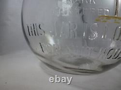 The Nut House Antique Store Glass Display Jar with nut scoop or creamer