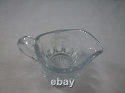 The Nut House Antique Store Glass Display Jar with nut scoop or creamer