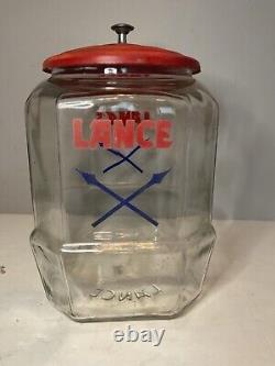 Vintage 8 Sided Lance Cracker Glass Jar withRed Metal Lid Arrows Logo