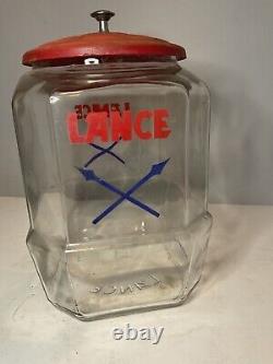 Vintage 8 Sided Lance Cracker Glass Jar withRed Metal Lid Arrows Logo